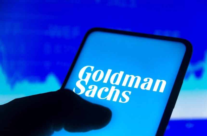 Goldman mengalami penurunan laba seperempat lagi dan mengumumkan reorganisasi